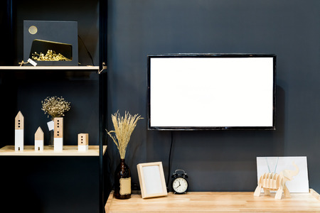 Modern wood shelf with flat TV in living room at home. Living room interior.の写真素材