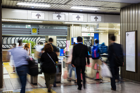 Blurred crowd of people at metro station in Tokyo,  Japan. Metro is a major transportation in Tokyo.のeditorial素材
