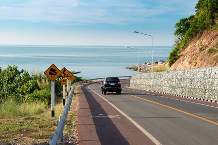 Sea side street near mountain with blue sky in clear day in Chanthaburi, Thailand.の写真素材