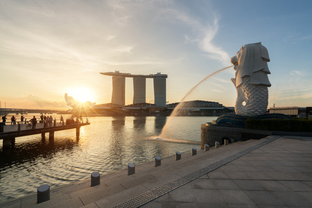 Singapore business district skyline with sunrise in morning at Marina Bay, Singapore.のeditorial素材