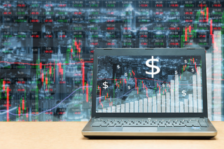 Laptop with stock exchange market business trading graph. Business marketing trade concept.
