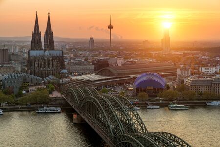 Image of Cologne with Cologne Cathedral and Rhine river during sunset in Cologne, Germany.の写真素材