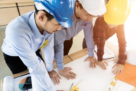 Asian engineer or architect meeting for architectural project. working with partner and engineering...