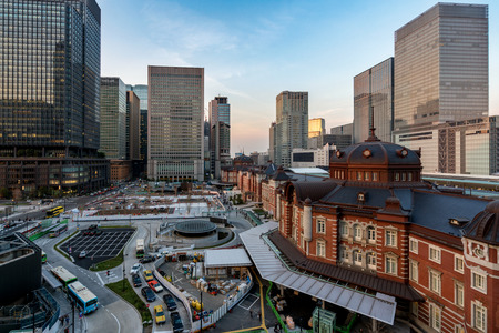 Tokyo railway station and Tokyo highrise building at eveing time in Tokyo, Japan.のeditorial素材