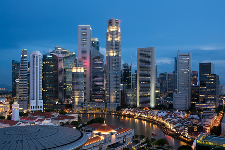 Aerial view of Singapore business district and city at night in Singapore, Asia.の写真素材