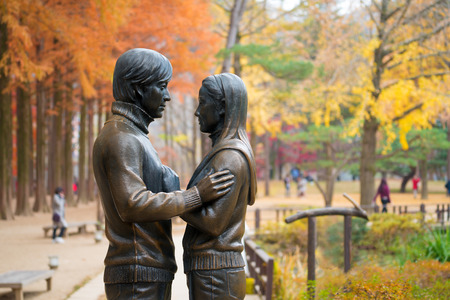 Nami island ,South Korea - November 7, 2017 : The statue and Tourists taking photos of the beautiful scenery around Nami Island in Seoul ,South Korea.のeditorial素材