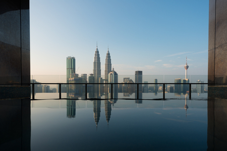 Swimming pool on roof top with beautiful city view Kuala lumpur, Malaysia.の写真素材