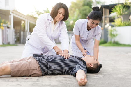Emergency CPR on a Man who has Heart Attack , One Part of the Process Resuscitation (First Aid)