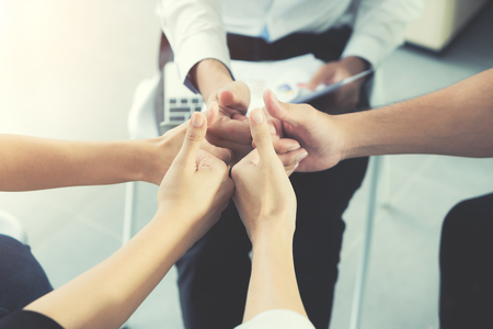 Group of Diverse Business People Hands Together Thump up of business people. Team Work Business Conceptの写真素材