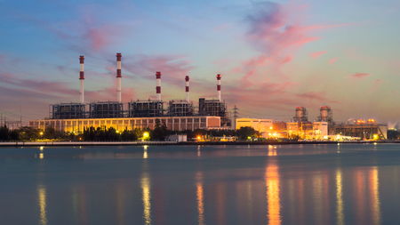 Landscape Boiler in stream power plant at night. Electricity power plant.の写真素材