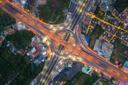 Aerial view of highway junctions Top view of Urban city, Bangkok at night, Thailand.の写真素材