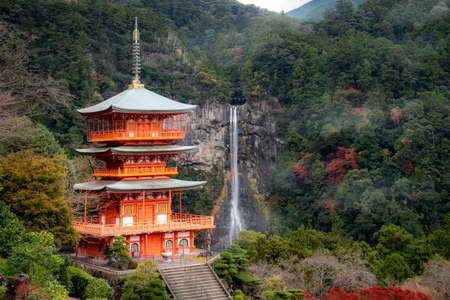 Seigantoji Pagoda in Kumano nachi taisha shrine temple with Nachi waterfalls  in view at autumn seasonのeditorial素材