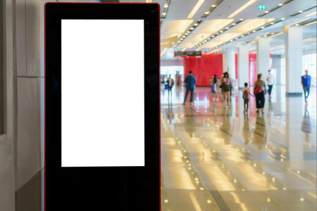 In the exhibition center corridor, white mock-up billboards await your creative touch, ready to showcase captivating publicity signs and messages.の写真素材