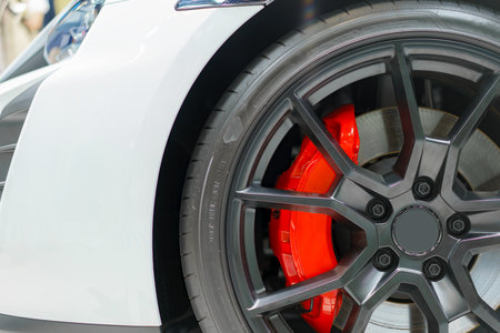 Elevate your sports car to unparalleled performance with our Velocity Fusion Alloy Wheels featuring cutting-edge racing calipers and brakes. Crafted for speed enthusiasts who demand excellence, these high-performance wheels seamlessly blend style and functionalityの写真素材