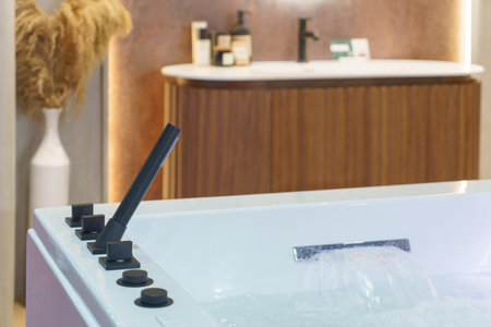 Modern shower and bathtub combination designed for luxury and convenience, it features a sleek glass...