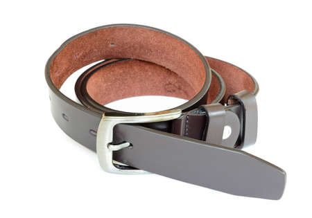 brown leather belt on whiteの写真素材