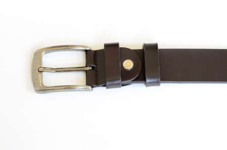brown leather belt on whiteの写真素材
