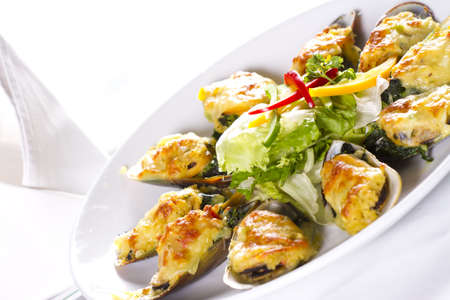 Cheese mussel, Baked mussels with cheese and garlicの写真素材