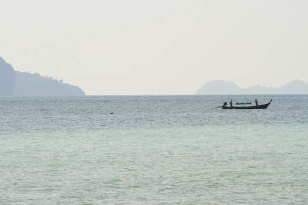 long tail boat, Boat travel in the middle of Andaman sea の写真素材