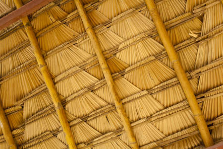 natural roof, detail of weave bamboo and palm leaf roof の写真素材