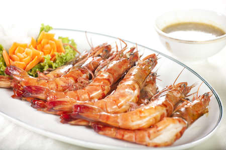 roasted shrimp, orange prawns roasted grill dish with Thai spicy sauceの写真素材