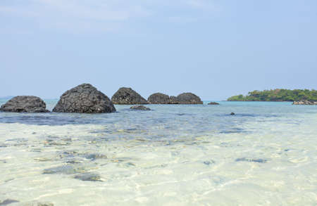 black rock beach, black rock beach with clear water and blue skyの写真素材