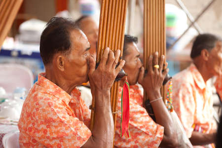 reed mouth organ, Thai style local instrument with band player のeditorial素材