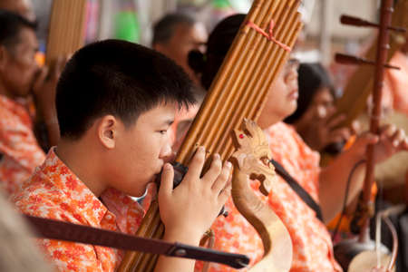 reed mouth organ, Thai style local instrument with band player のeditorial素材