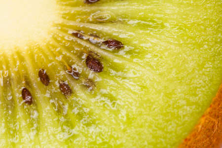 kiwi texture, kiwi fruit close-up texture showing seedsの写真素材