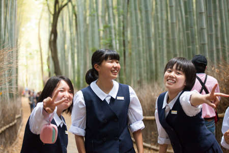 Japanese student, Kids Japanese student smiling pose in Arayshiyama, Japanのeditorial素材