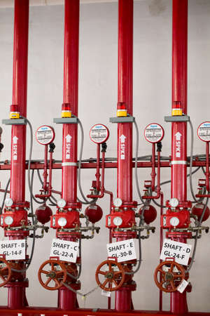 pipe system, red pipe system attached on wall building