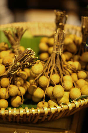 longan fruit, medium size of Longan fruit in basket selling at the marketの写真素材
