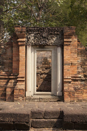 historical park detail, texture of lintel over door at historical ancient city, Petchaboon,Thailandの写真素材