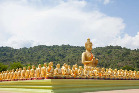 Buddha differences image act of golden Buddha with the main Buddha statue outdoor Thailandの写真素材