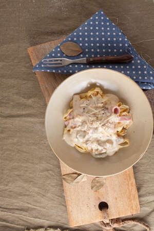 Carbonara Pasta, white sauce carbonara pasta with ham and mushroomの写真素材