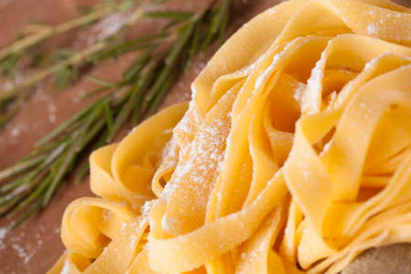 Fresh Pasta, close-up texture of Home made tagliatelle pasta flour ribbon noodleの写真素材