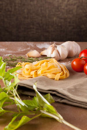 Pasta menu, Preparation of pasta recipe ingredients with empty notebookの写真素材