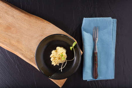 mashed potatoes, a dish of decorated mashed potatoes set on a dining tableの写真素材