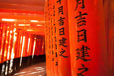 Fushimi Inari Taisha, Japanese name on the famous red pole or torii in Fushimi Inari taisha Kyoto, Japanのeditorial素材