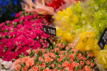 flower shop, Colourful many kinds of flower selling in flower in Japanese market with priceの写真素材