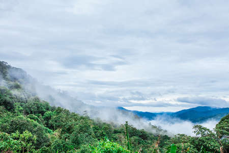 green mountain and cloud, scenic of cloudy sky with mountain hill and green forest in Thailand