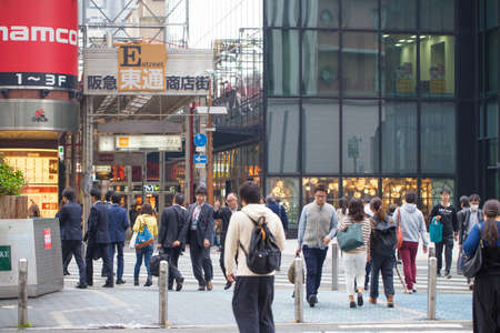 OSAKA - NOV 11 : CIty center showing human traffic of Osaka in Japan on NOV 11, 2015. Osaka is Japan's popular city of destinationのeditorial素材