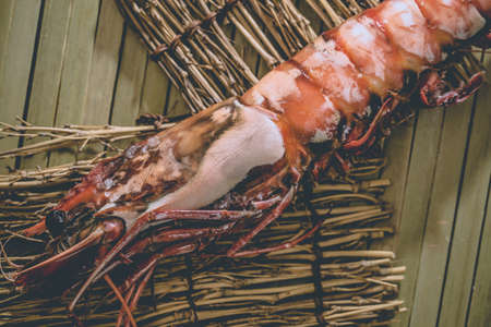grilled prawn, Japanese style grilled prawn on bamboo decorate dishの写真素材