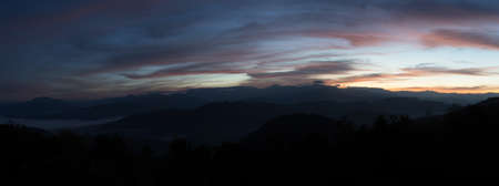 a panorama view of sunrise over the hill at Tak province, Thailandの写真素材