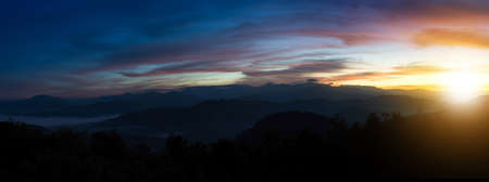 a panorama view of sunrise over the hill at Tak province, Thailandの写真素材