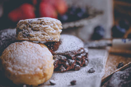 Mix flavour of scone biscuit decorate with chocolate chip and fresh strawberry and blueberryの写真素材