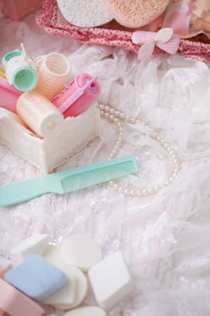 Beauty cosmetic tools and hair accessories in basket.の写真素材