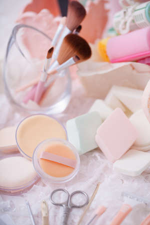 Beauty cosmetic tools and hair accessories in basket.の写真素材