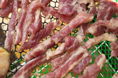 Sun dried pork, a preservation food style in local Thailand.の写真素材