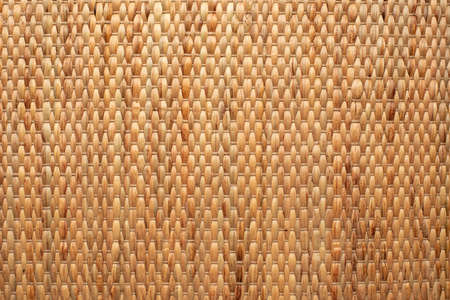 wallpaper showing rustic texture of dried water hyacinth handcraft placemat.の写真素材